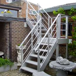 Aluminum exterior stairs to access a flat roof terrace