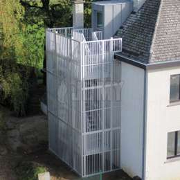 Caged industrial staircase for a flat building.