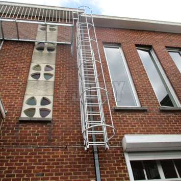 Drop-down fire escape ladder