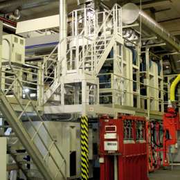 Escalier d'acces JOMY pour la production industrielle - Societe active dans la realisation des etiquettes plastiques pour les emballages