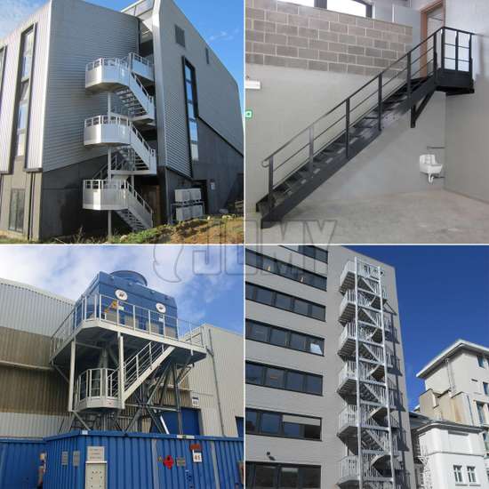 Aluminum stairs made for egress and access and placed outside of a medium sized building.