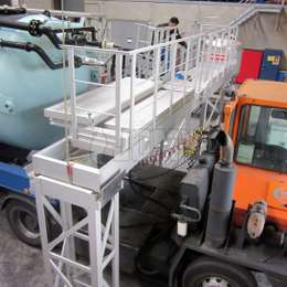 Aluminium industrial levi-bridge platform used for accessing tanker trailer equipment for maintenance.