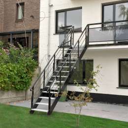 Aluminum deck stairs for garden access.