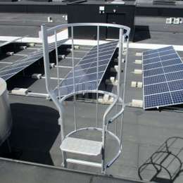 Roof ladder for solar panel maintenance