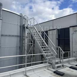 Stairs leading to a tank.